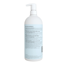 Cargar imagen en el visor de la galería, Botella vista trasera Acondicionador profesional Ouidad Moisture Lock Leave-In 1L sin enjuague.