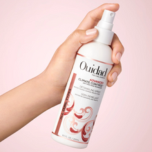 Cargar imagen en el visor de la galería, Mano usando Spray Ouidad Advanced Climate Control 250ml para protección térmica y desenredado.