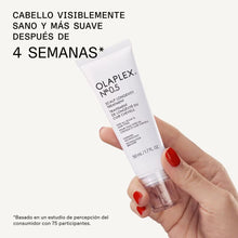 Cargar imagen en el visor de la galería, mano sosteniendo producto olaplex N°0.5 scalp
